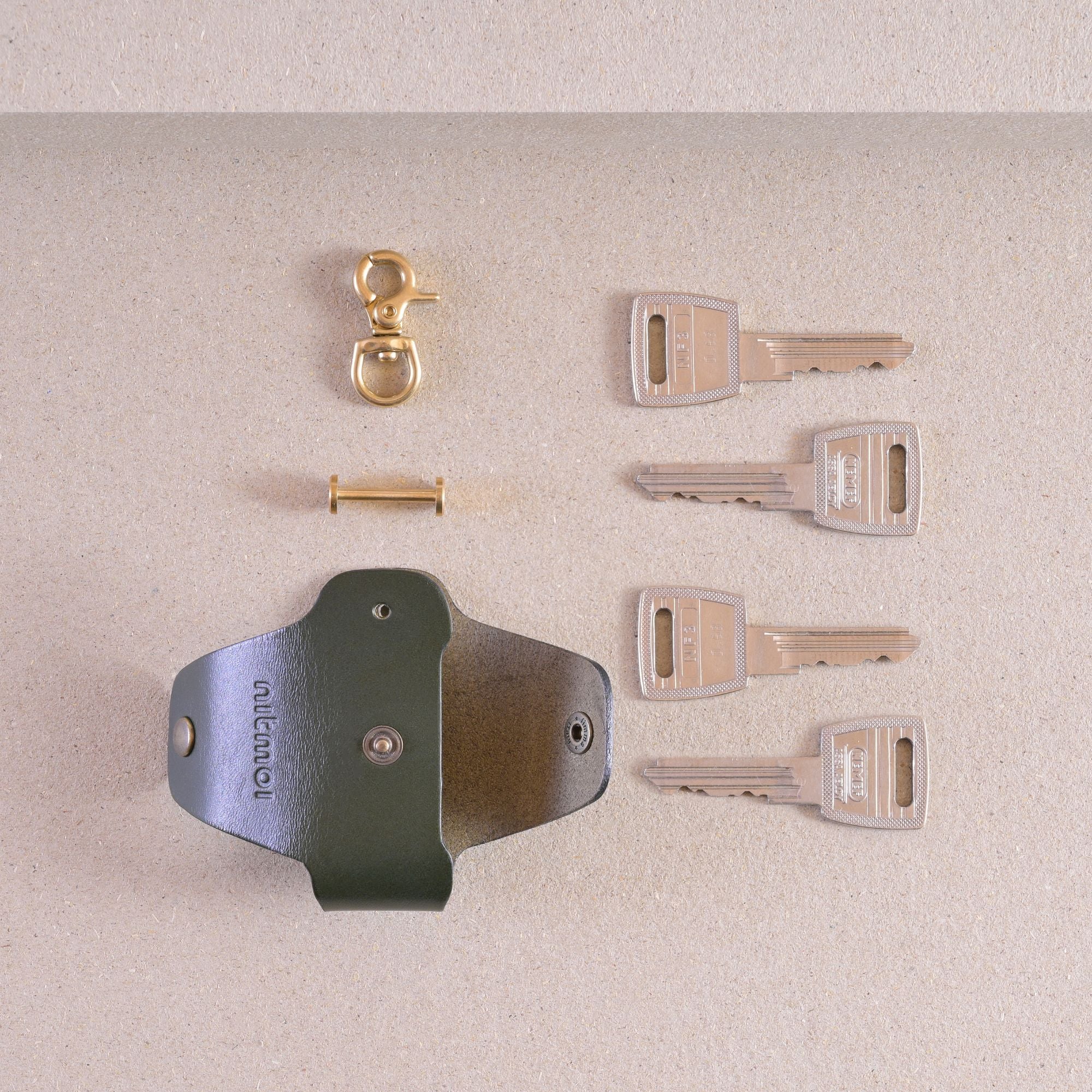 Open leather key holder with brass screw and keys